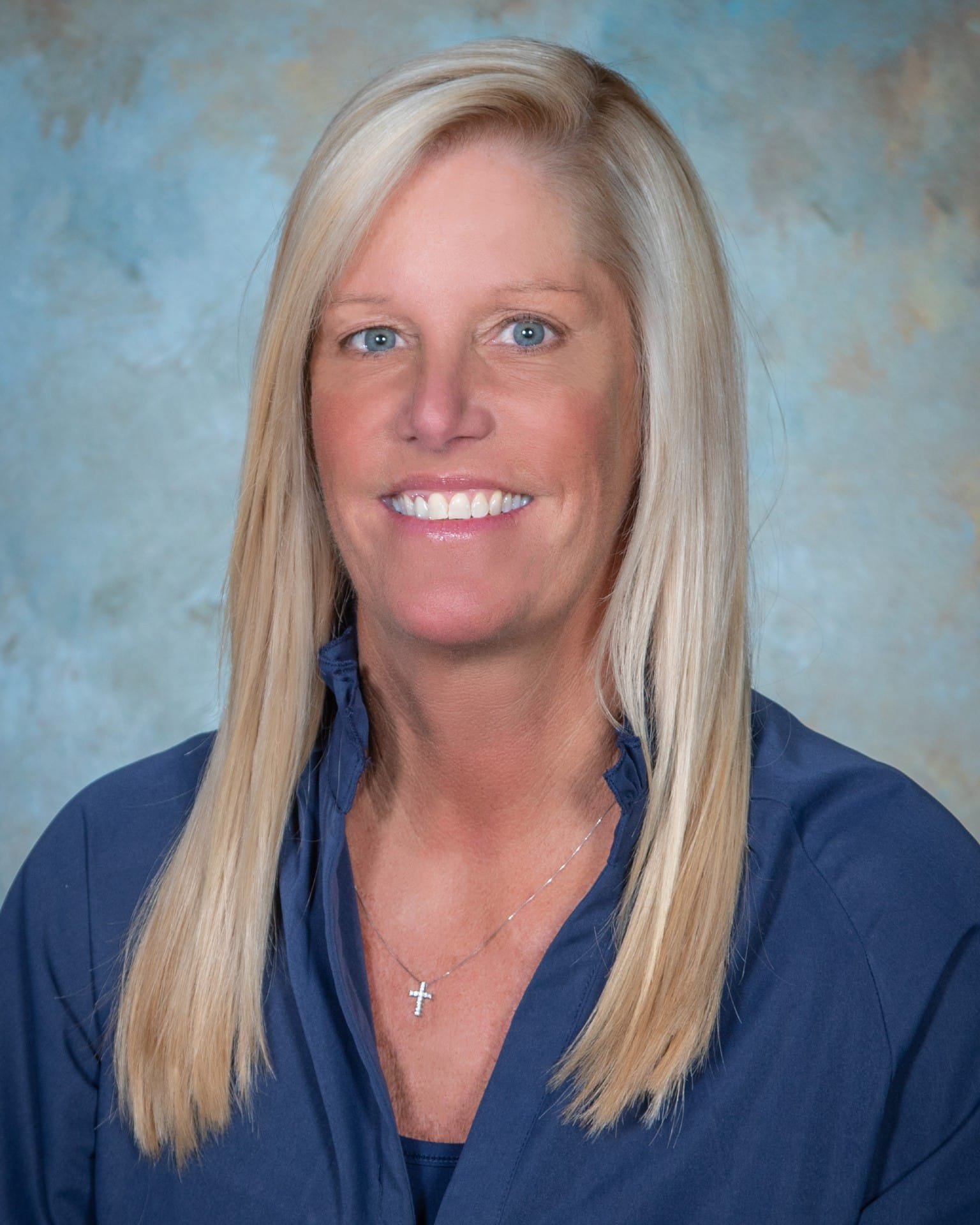 a woman smiling for the camera