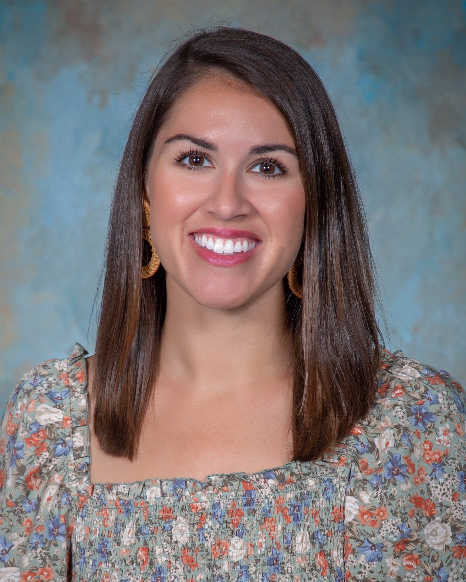 a woman smiling for the camera