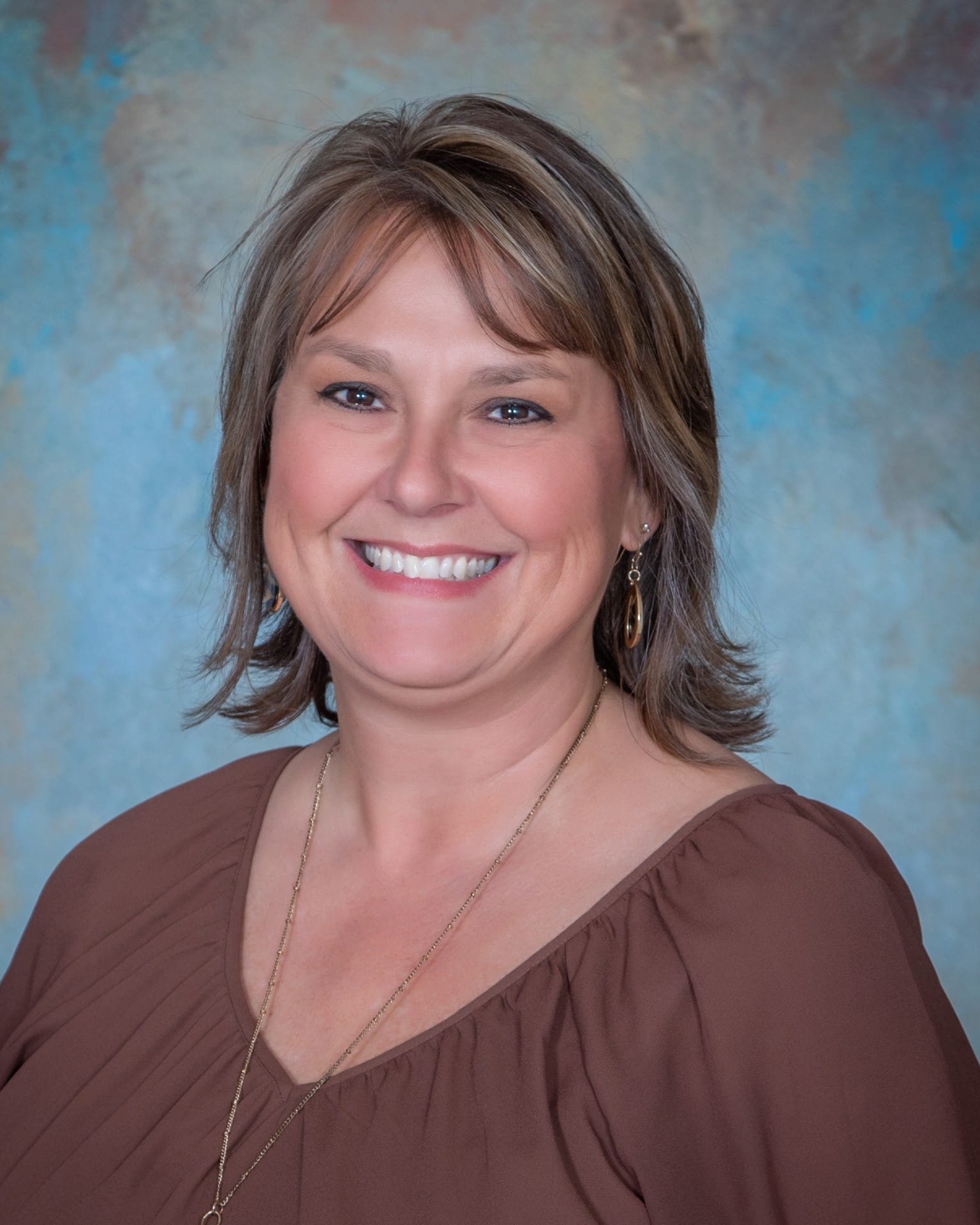 a woman smiling for the camera