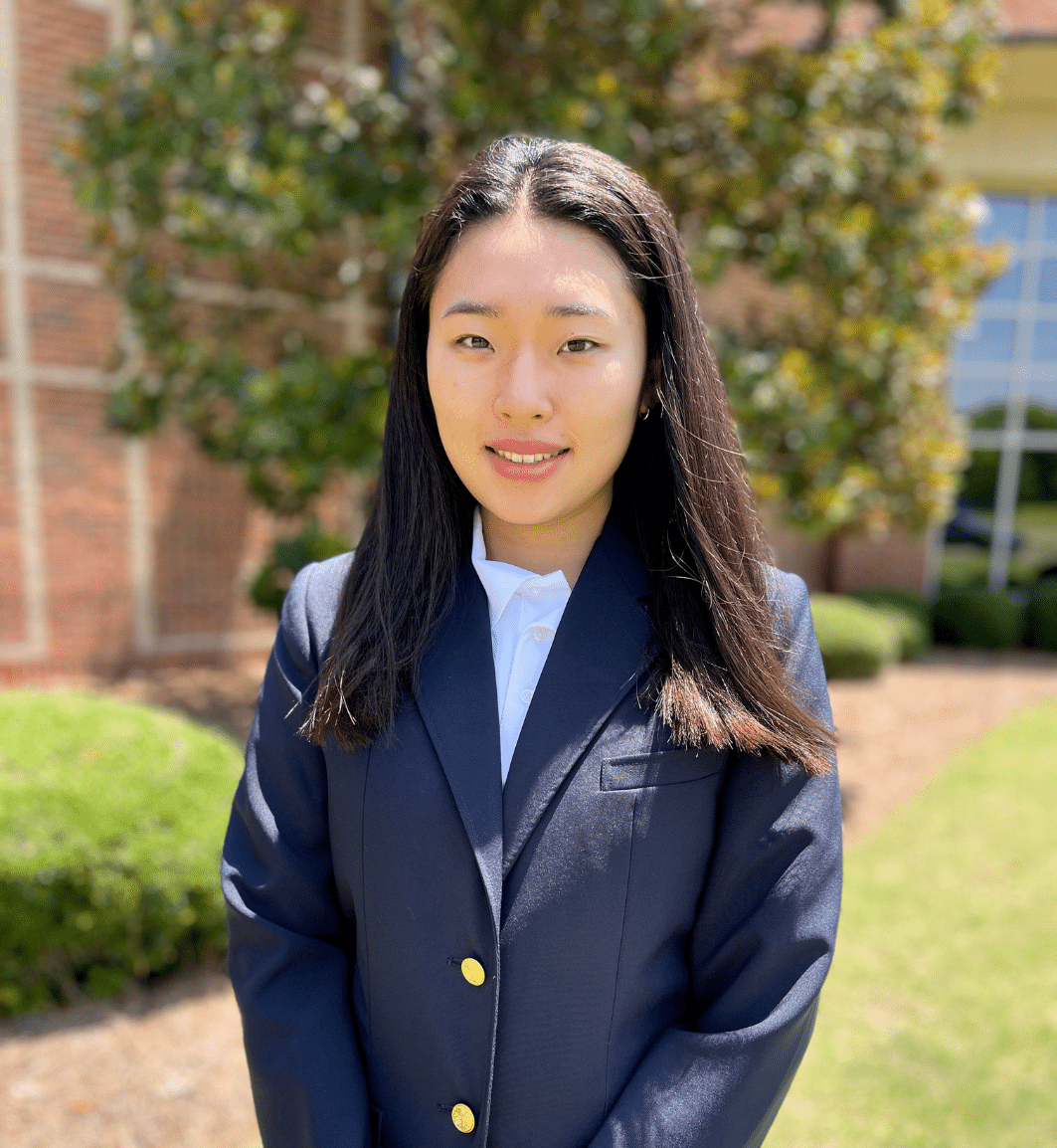 a person wearing a suit and tie