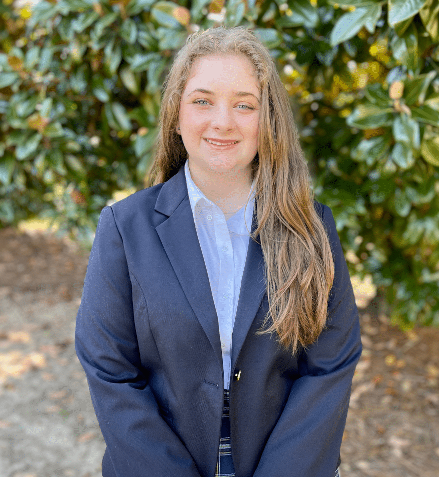 a person wearing a suit and tie